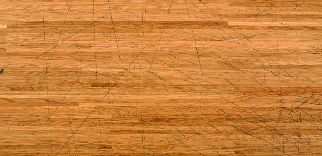 why does bamboo flooring scratch easily
